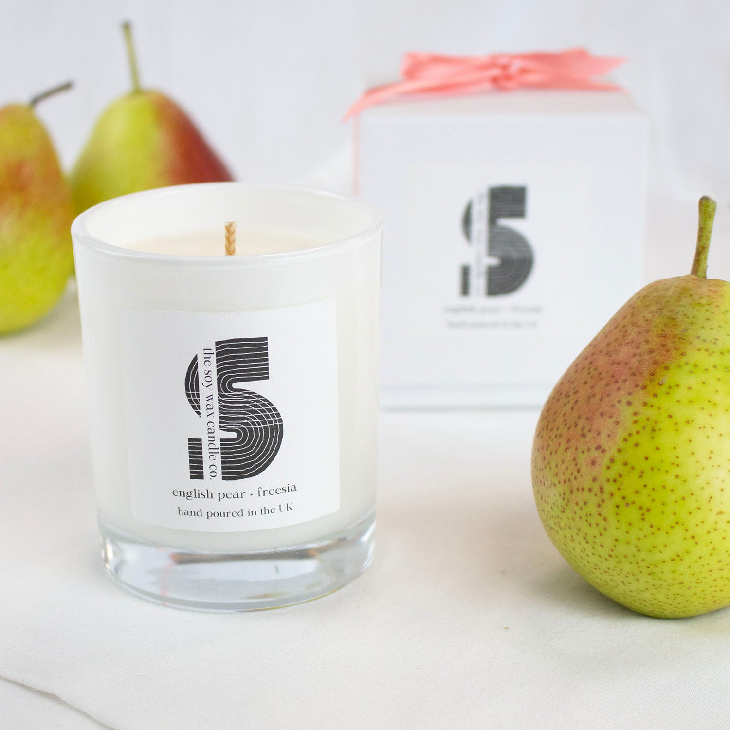 English Pear & Freesia
Hand poured in the UK by The Soy Wax Candle Company, 20cl soy wax candle in white gloss jar with English pear & freesia fragrance, fresh floral home fragrance candle gift