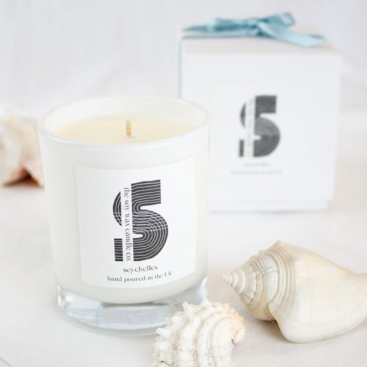 Seychelles Candle
Hand poured in the UK by The Soy Wax Candle Company, 20cl soy wax candle in white gloss jar with Seychelles fragrance, natural citrus home fragrance candle gift